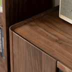 Sleek side profile of the Horizon media cabinet, highlighting the smooth edges and handcrafted joinery.