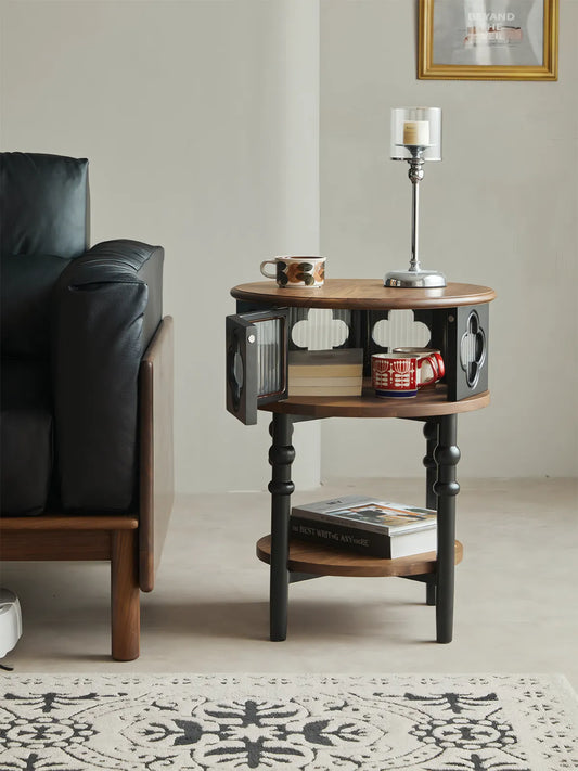 Sylvan nightstand with fluted glass door open, revealing internal storage capacity.