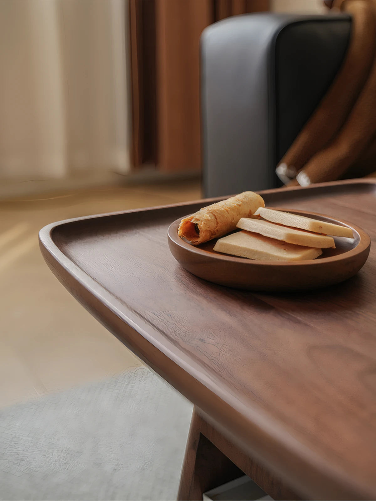 Lifestyle shot of coffee and snacks placed securely on the tray top of the Walnutry solid walnut side table.