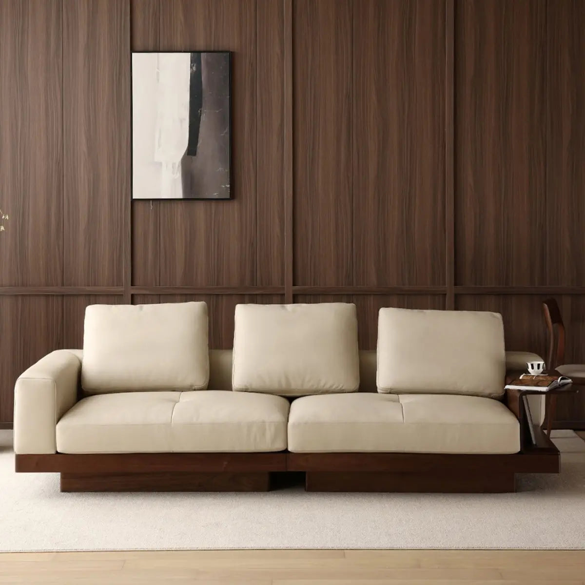 Rear view of the sofa showcasing the vertical solid walnut slat design, perfect for open floor plans.