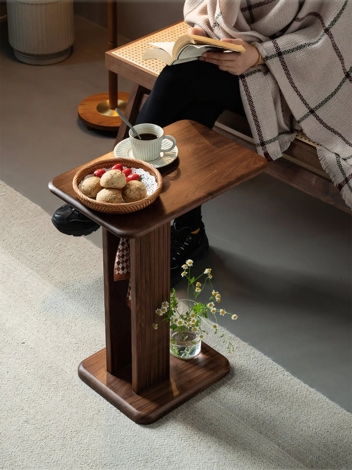 Top-down view of the Meridian C-Table surface, displaying the unique cathedral grain patterns of FAS-grade black walnut wood.
