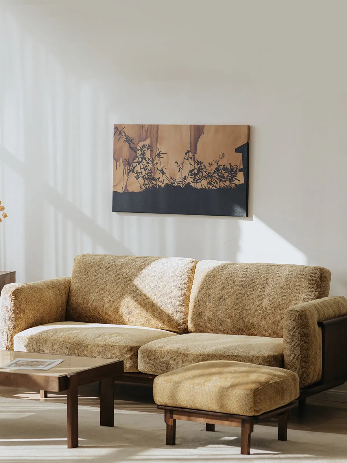 Alden Ridge sofa in wheat fabric styled in a bright living room with ottoman and wall art