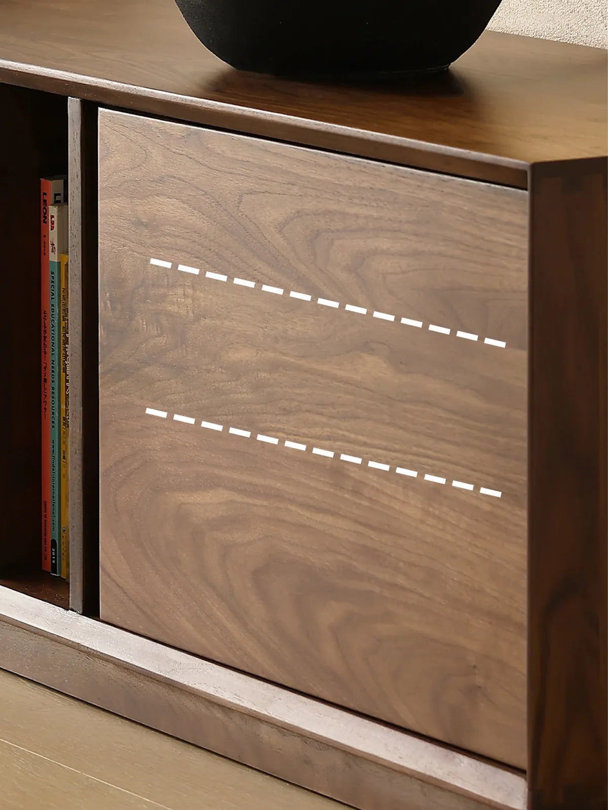 Walnutry Arden solid wood tv cabinet door detail in rich walnut grain