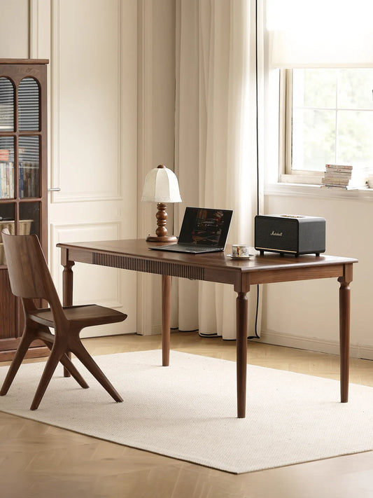 Pair of Arlen Dining Chairs styled beside a walnut table in a contemporary interior.