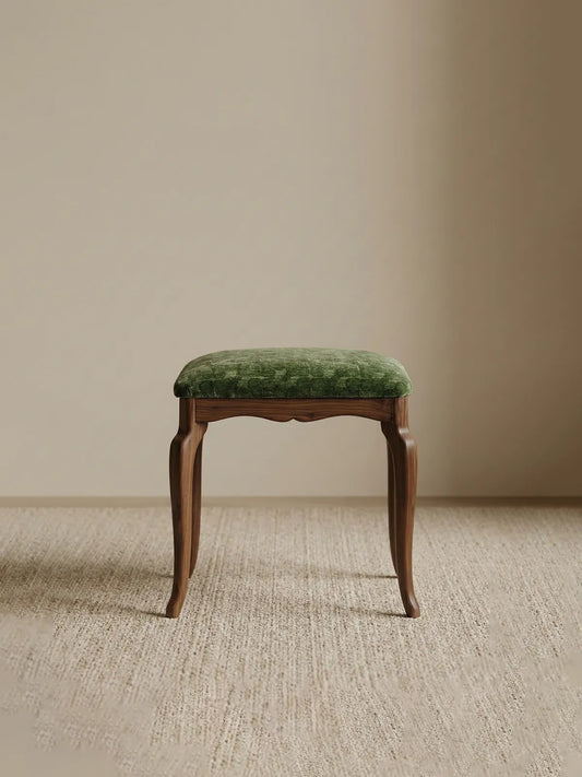 A clean, minimalist studio shot of The Bourbon Vanity Stool against a neutral background.