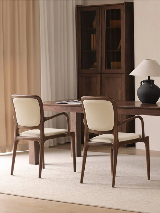 Close-up side view with a dimension line indicating a 46 cm seat height on the Cael dining arm chair.
