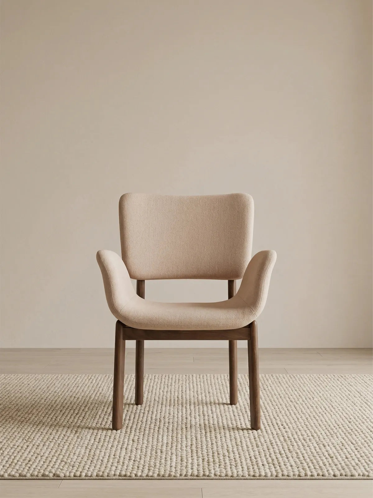 Front view of a beige upholstered dining chair with arms and solid walnut frame (Oatmeal)