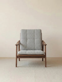 Front view of the Haven solid wood chair, featuring a mid century modern design, light gray cushion and thick cushions. (Light Gray)