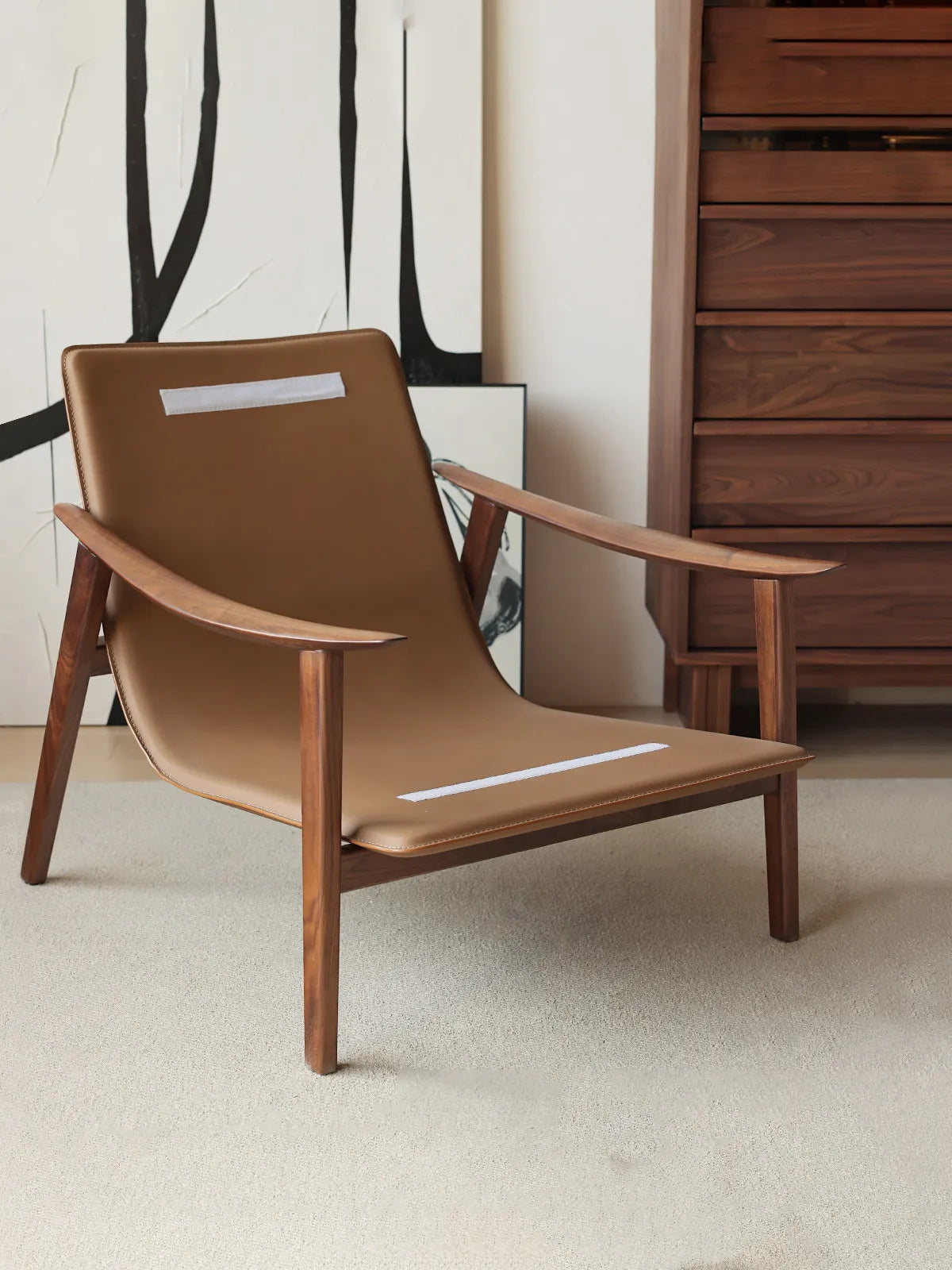The robust frame and leather strap suspension base of our solid wood chair.