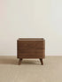 Clean, straight-on studio front view of The Helios 2-Drawer Nightstand, showcasing its balanced proportions and rich North American Black Walnut color.