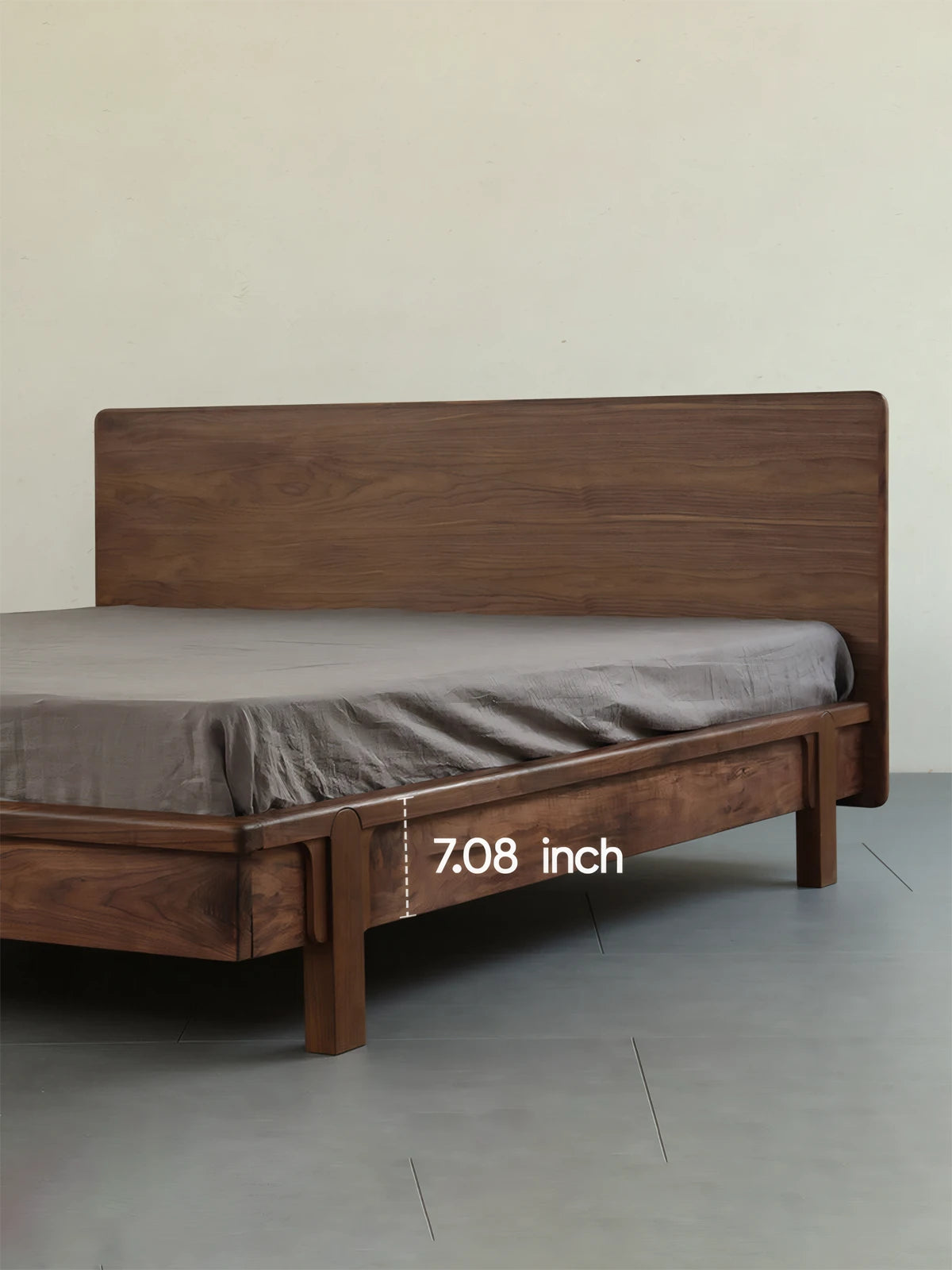 Side view of The Helios platform bed demonstrating the 7.08-inch under-bed clearance, perfect for easy cleaning and extra bedroom storage.