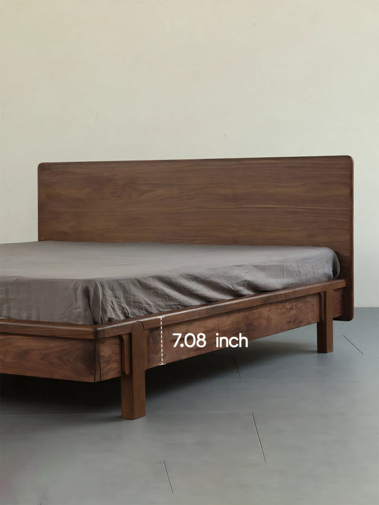 Side view of The Helios platform bed demonstrating the 7.08-inch under-bed clearance, perfect for easy cleaning and extra bedroom storage.