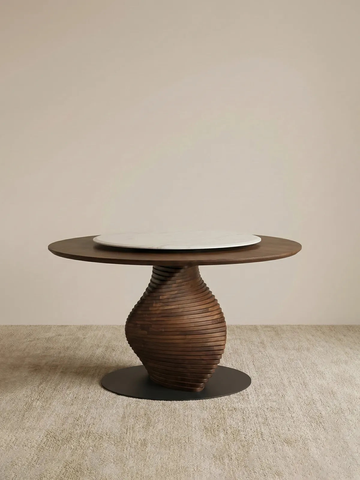 The Helios Round Dining Table by Walnutry featuring a sculptural spiral solid wood pedestal base and a white marble turntable in a clean studio setting.