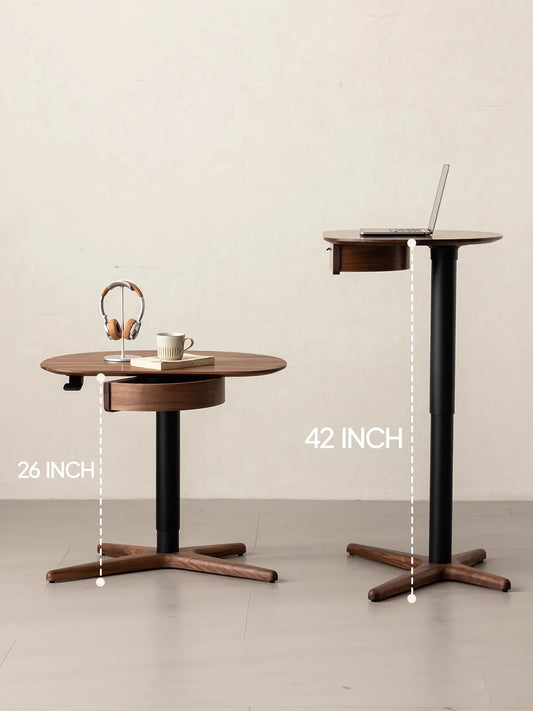 Side-by-side visual comparison demonstrating the impressive height range of The Heritage table, transitioning from a 26-inch sitting table to a 42-inch standing desk.