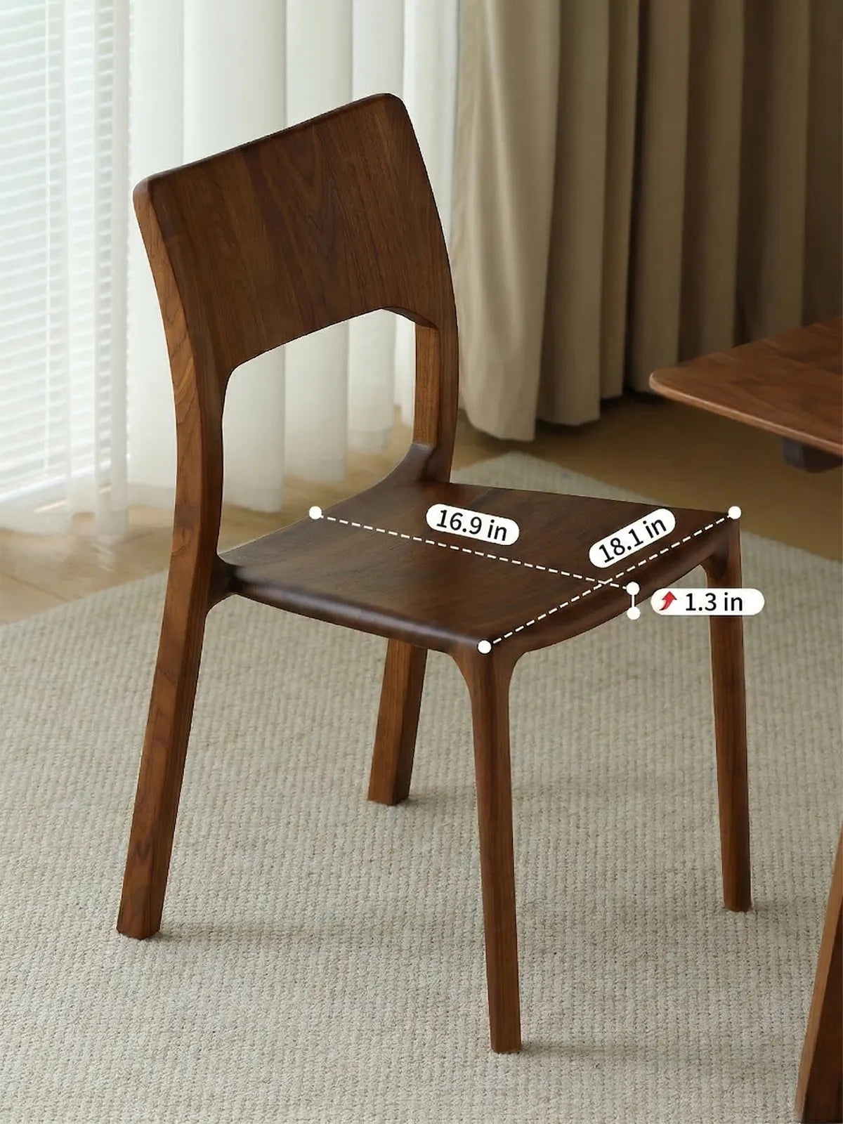 Angled view of The Heritage Dining Chair with dimensional text detailing the precise width, depth, and thickness of the solid wood seat.