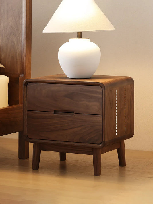 Side profile of our solid wood bedside table, emphasizing the continuous natural grain and sturdy mortise and tenon construction.