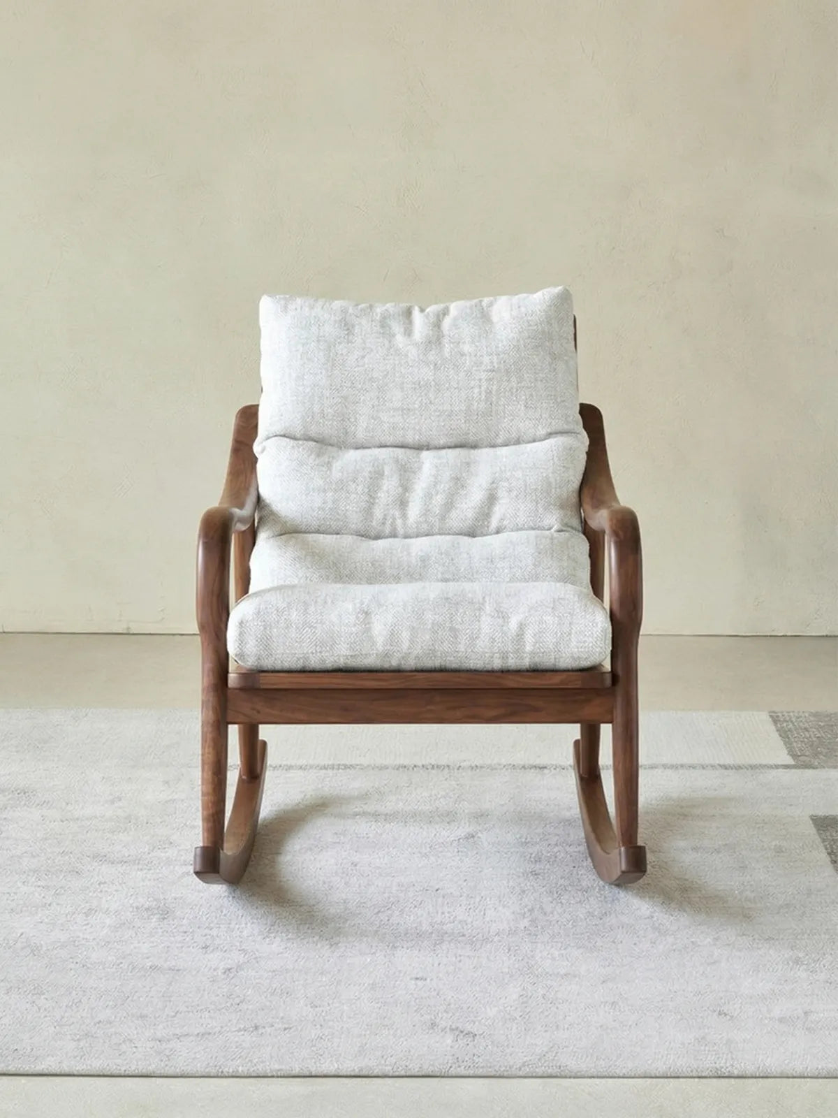 Walnutry Heritage Rocking Lounge Chair front view with upholstered cushions, sculpted walnut frame, and balanced proportions for an antique lounge chair inspired modern home