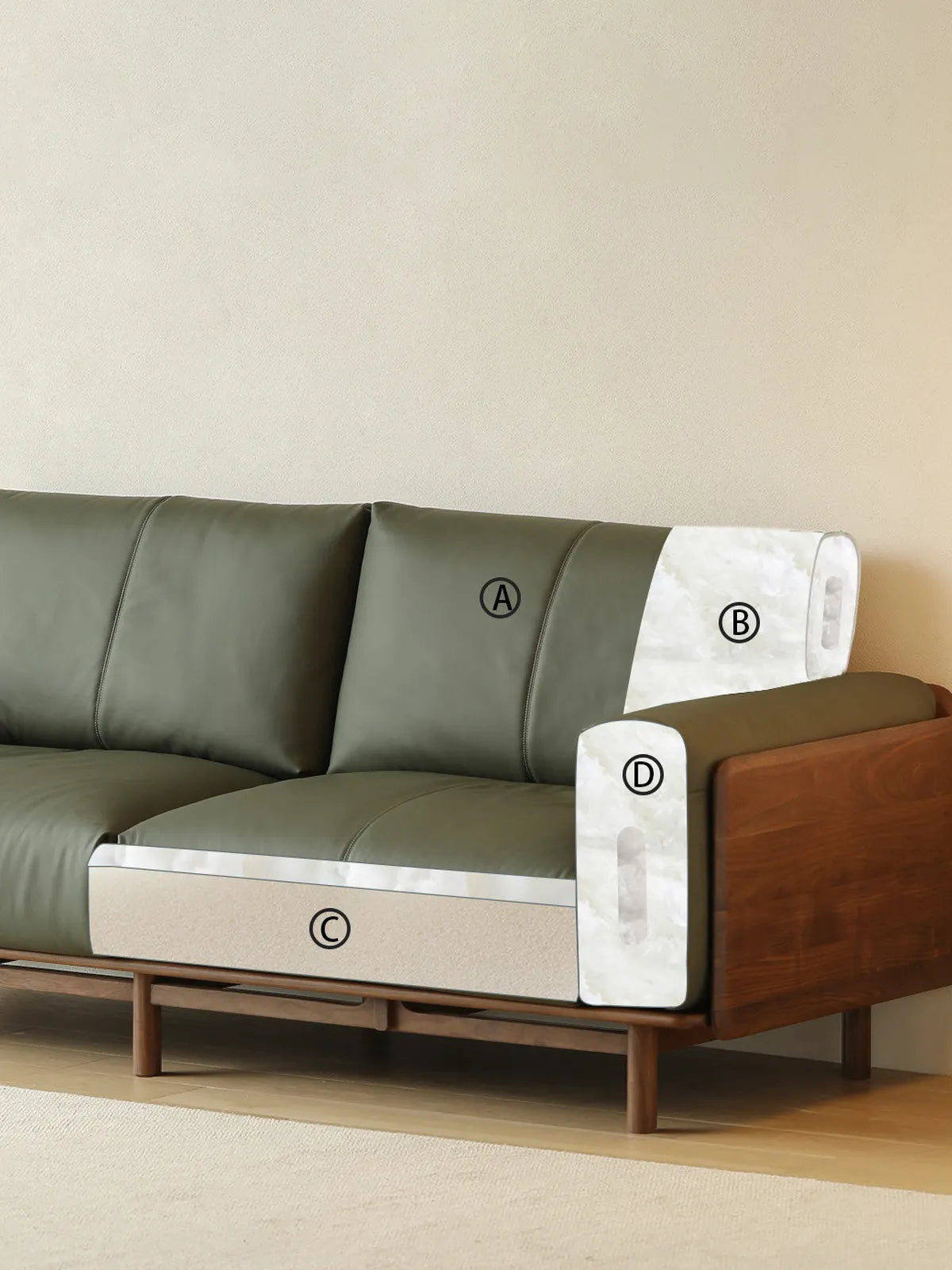 Side view of Lior sofa showing cushion construction zones and walnut arm panel in green leather variant