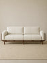 Lior three-seat sofa in white fabric upholstery with solid American black walnut frame, front view (White)