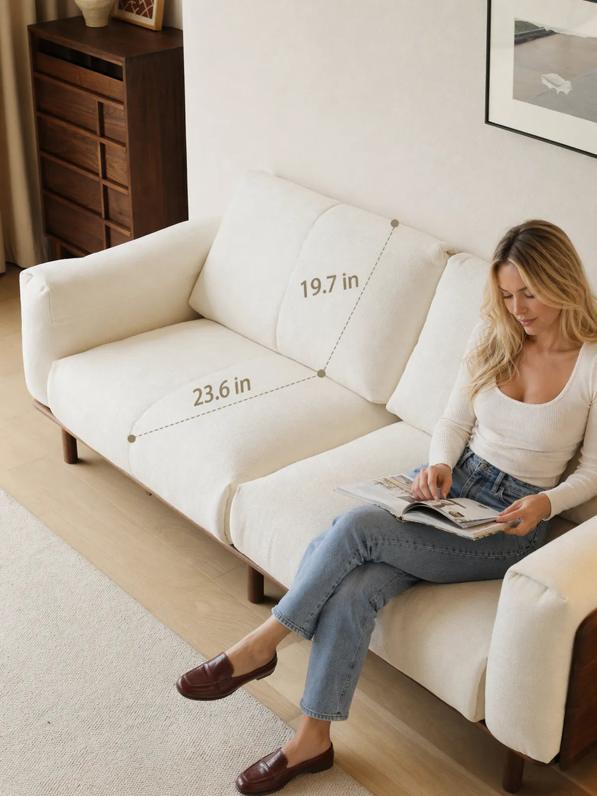 Overhead view of Lior sofa in white fabric showing seat depth of 23.6 inches and backrest height of 19.7 inches
