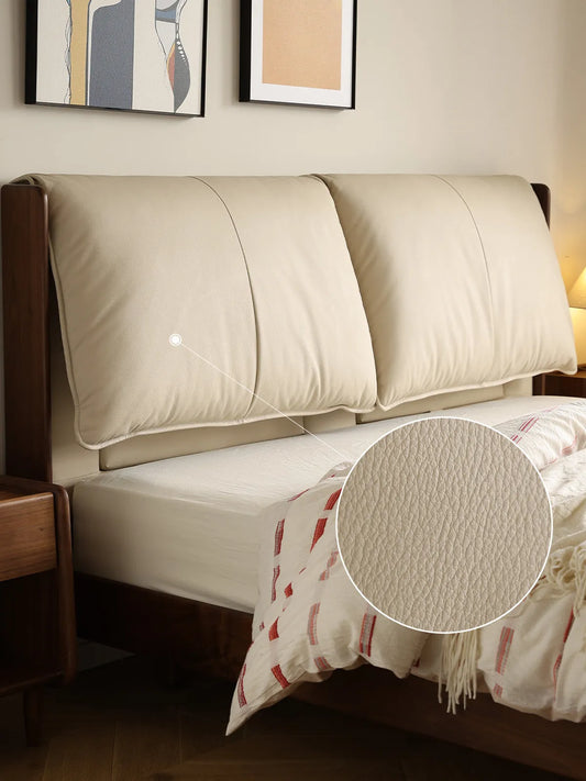 Macro view and magnified circle revealing the premium stain-resistant leather texture on the mid century modern platform bed frame.