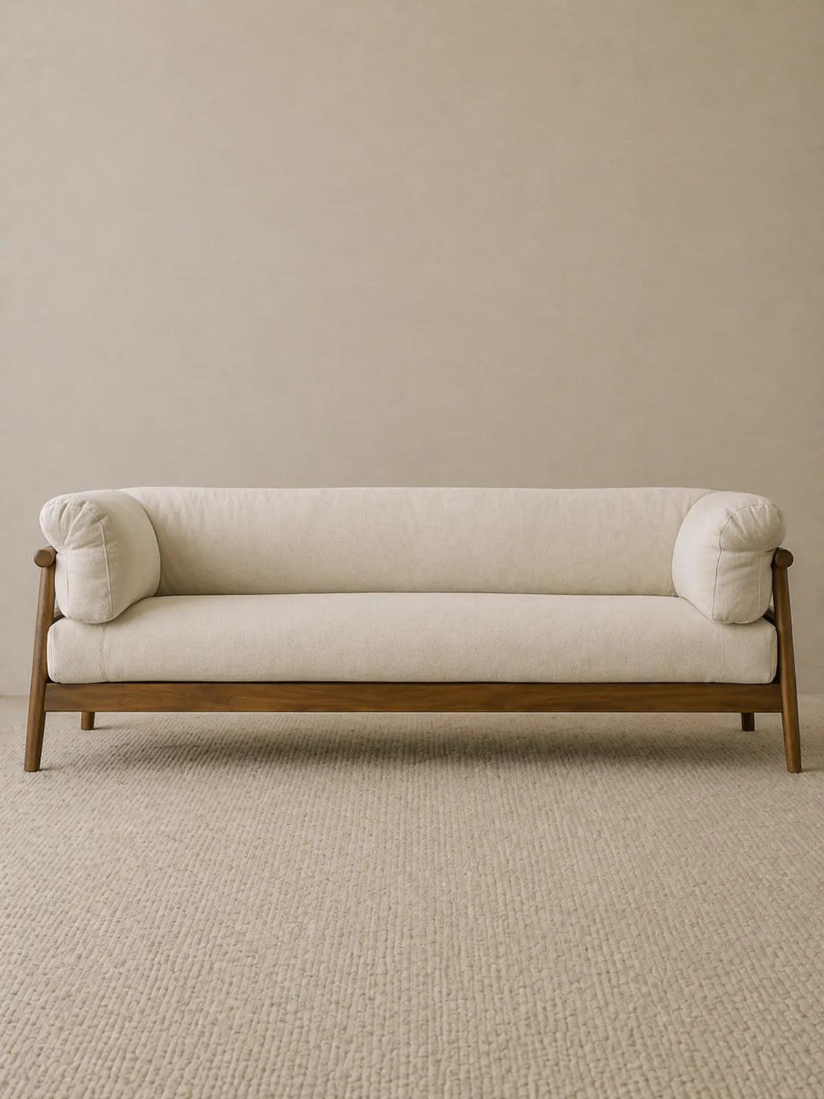 Oslo 3-seater sofa in cream bouclé with solid walnut frame, front studio view (3-Seater)