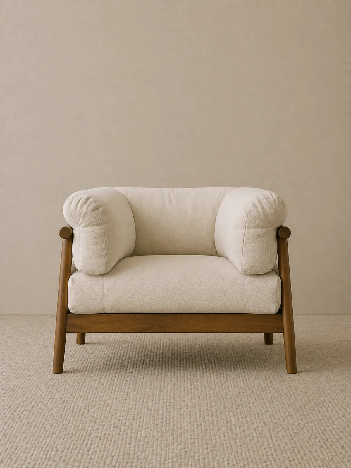 Oslo single accent chair in cream bouclé with solid walnut frame, front studio view (Single)