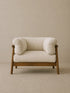 Oslo single accent chair in cream bouclé with solid walnut frame, front studio view (Single)
