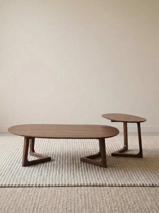 The minimalist Pebble Nesting Coffee Table Set in North American Black Walnut against a clean white background.