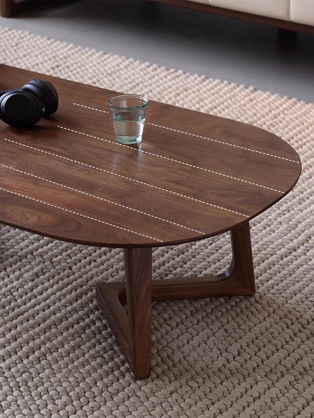 Beautiful, continuous North American Black Walnut wood grain on the surface of The Pebble Nesting Coffee Table.