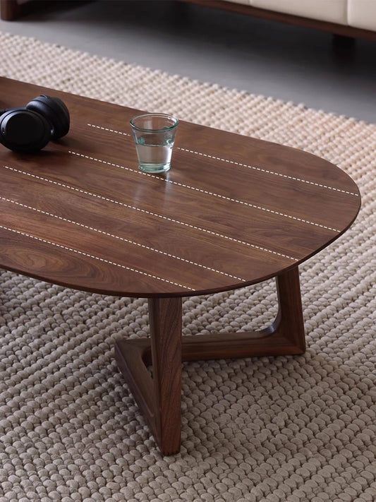 Beautiful, continuous North American Black Walnut wood grain on the surface of The Pebble Nesting Coffee Table.