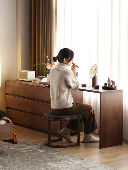 Walnutry Rowan vanity desk used for makeup and daily routine by the window