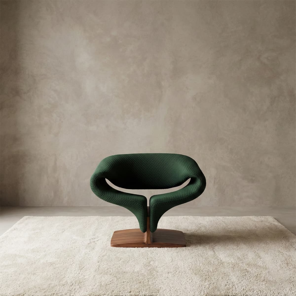 Artistic sculptural green fabric accent chair with a unique curved shape and a solid walnut pedestal base, a statement piece for modern interiors.