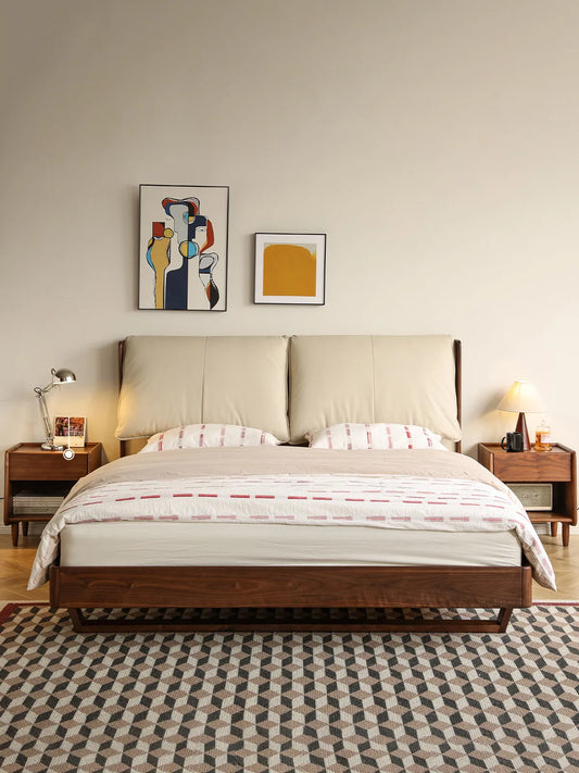 A complete bedroom set showcasing the solid wood platform bed frame paired with matching walnut nightstands and cozy neutral bedding.