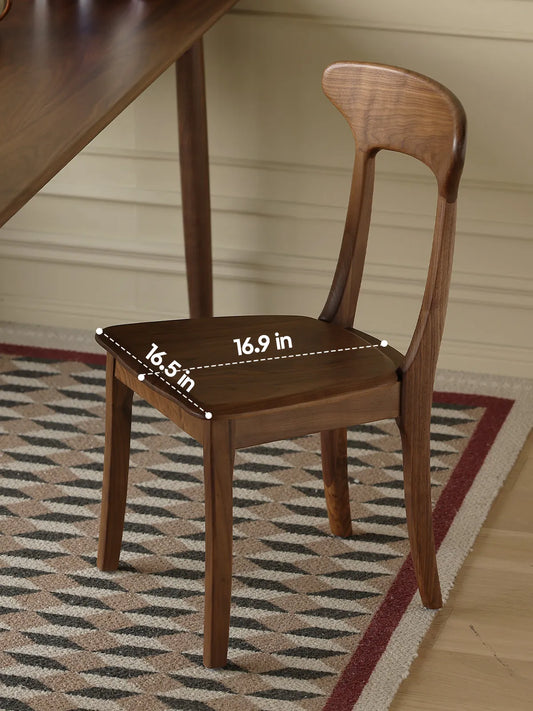 Sora walnut dining chair from above showing seat dimensions of 16.9 in by 16.5 in