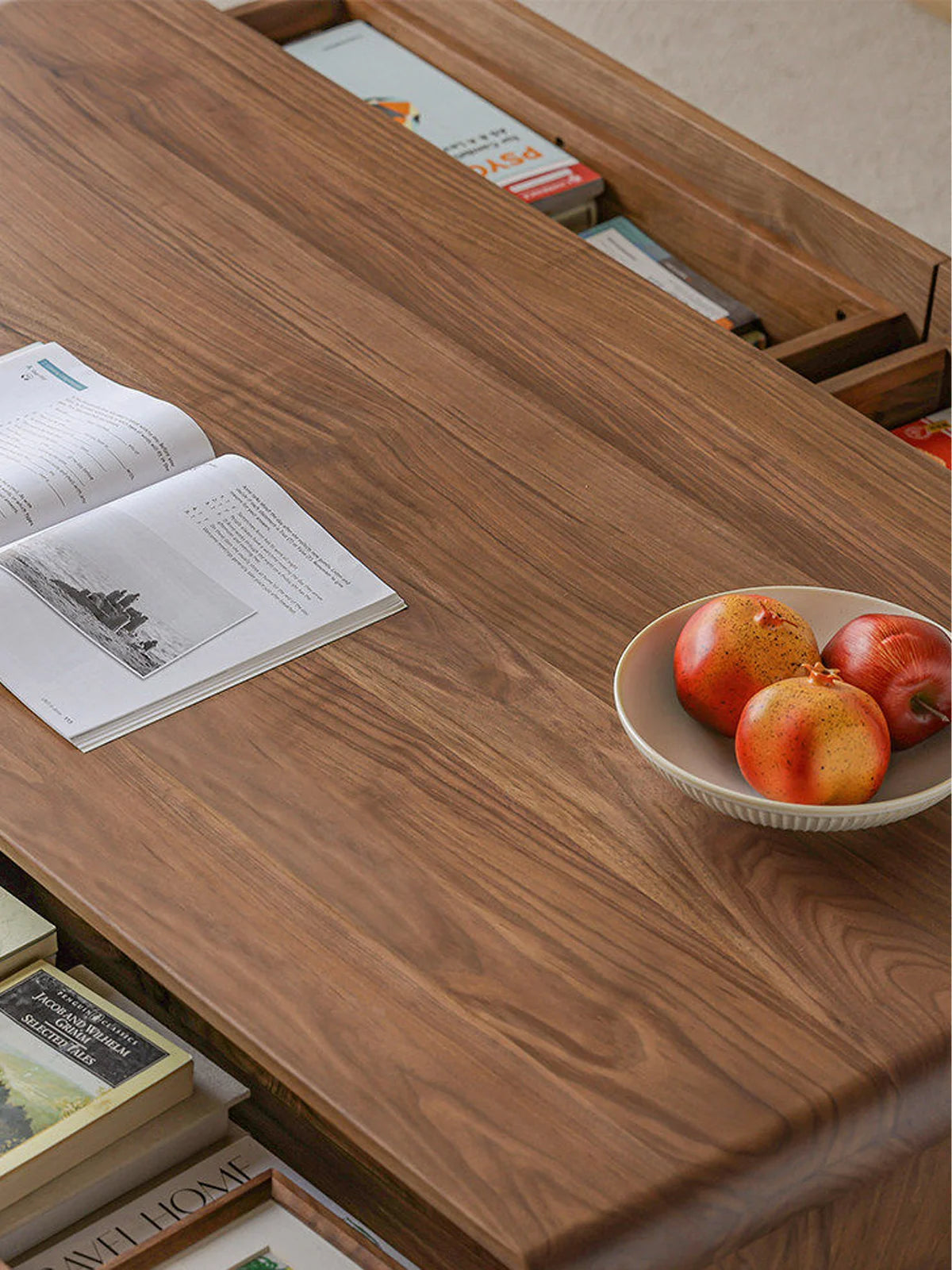 Top view of a Japandi walnut coffee table with rich wood grain and concealed storage compartments