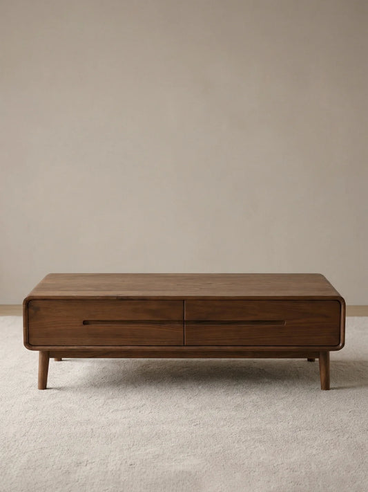 Front view of a solid walnut rectangular coffee table with two drawers and rounded frame edges