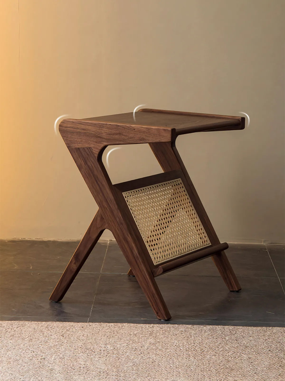 Side profile of the Z-shaped end table showing the structural angles and the natural rattan cane mesh detail.