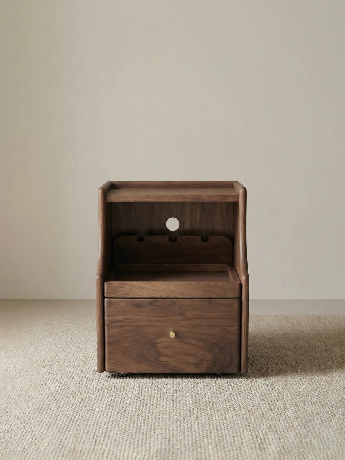 Studio front view of the Walnutry Vantana solid black walnut nightstand with drawers and open shelf.