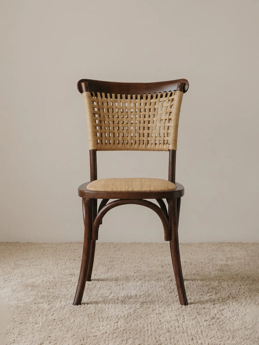 Vilen woven rattan dining chair in solid walnut, front view showing cross-hatch backrest and herringbone seat